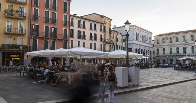 time lapse view of restaurants in Piazza dei Signori, Clocktower of Ufficio Demografico e Anagrafe visible in background, Padua, Veneto, Italy, Europe