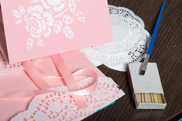 Making greeting cards from paper, cardboard and tape.