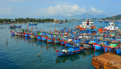 Fototapeta na wymiar Wooden boats docking at Da Nang Pier
