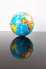World globe with reflection. Globalization Concept