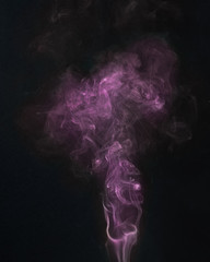 purple smoke on a black backround