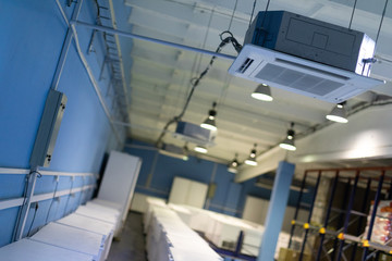 Warehouse with white refrigerators
