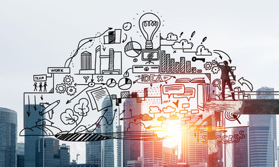 Businessman drawing business conceptual sketches.