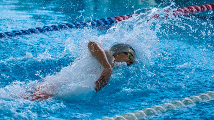 Swimmers compete in the sports pool