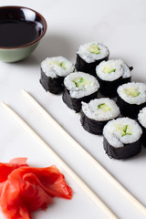 rolls with cucumber, ginger and soy sauce.