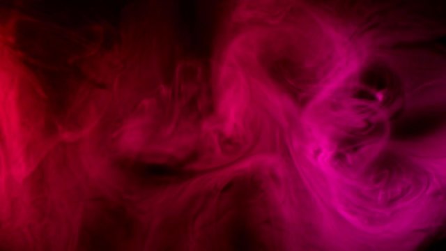 abstract red smoke waves moving at dark background 