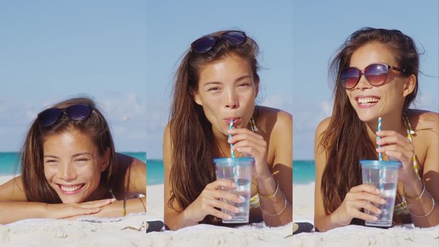 Vertical Video of Woman drinking water on beach smiling and laughing looking at camera. Girl on beach vacation in bikini sun tanning relaxing on beach holiday