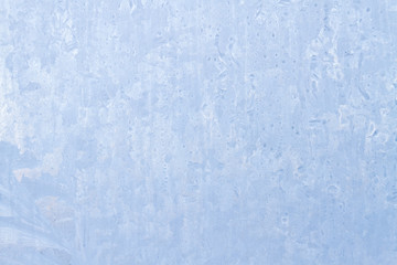 Frosty patterns on a frozen ice box in the early morning