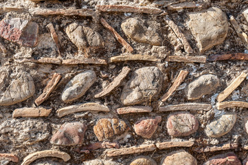 Detail of unusual ancient greek rock wall design and pattern near the Leonidaion in Olympia Greece where the first Olympics were held
