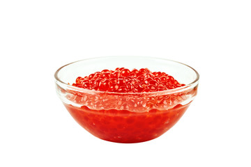 Red caviar in a glass container. Isolated object on white background.