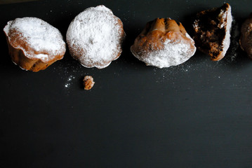 Chocolate cupcakes on a black background