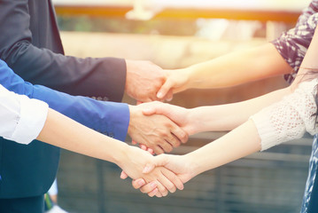 Business teamwork shaking hands