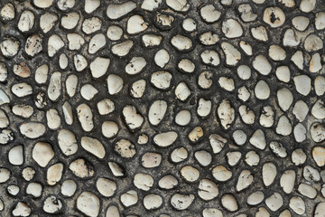 Wall made from polished river pebble stones