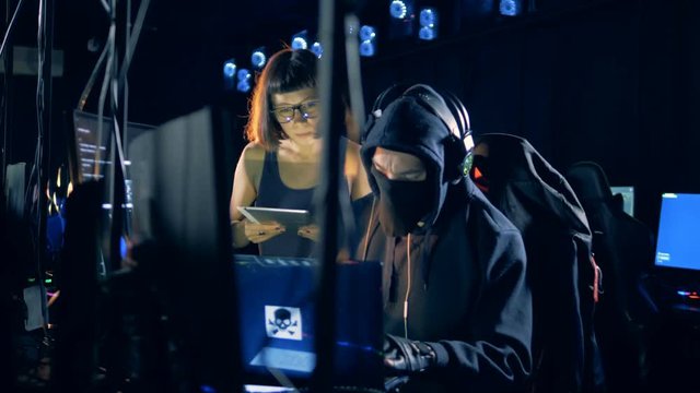People hack system, working with computer. Cyber crime and hacking concept.