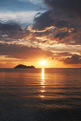 Bright sunset with under the sea surface. Thailand