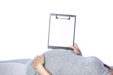 Happy pregnant girl lies on white background
