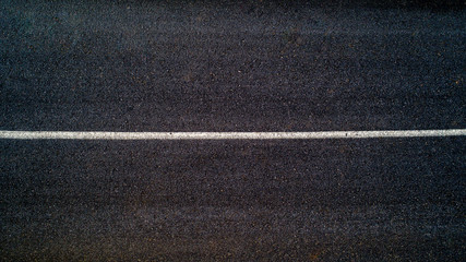 Aerial view of black asphalt road