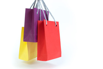 Paper shopping bags with handles on white background. Mockup for design.
