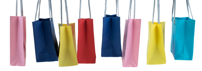 Paper shopping bags with handles on white background. Mockup for design. banner. panorama, banner.