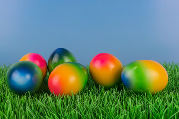 Fototapeta na wymiar Colorful Easter eggs in a meadow