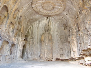 Luoyang Longmen grottoes. Broken Buddha and the stone caves and sculptures in the Longmen Grottoes...