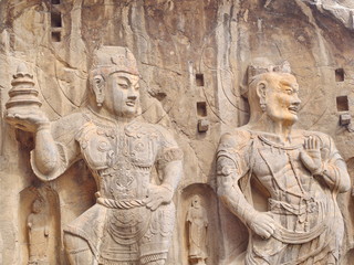 Luoyang Longmen grottoes. Broken Buddha and the stone caves and sculptures in the Longmen Grottoes in Luoyang, China. Taken in 14th October 2018