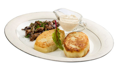 Potato zrazy with a meat filling on a white plate. Traditional Ukrainian zrazy recipe