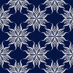 Floral seamless background. White pattern on dark blue backdrop