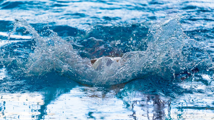 Swimmers compete in the sports pool