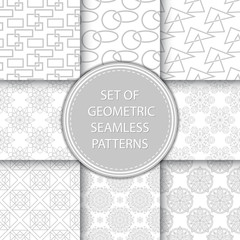 Compilation of seamless patterns. Gray abstract and geometric prints on white backgrounds