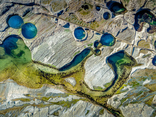 Rock pools on exposed coastal rock shelf platform