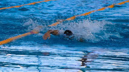 Swimmers compete in the sports pool