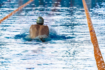 Swimmers compete in the sports pool