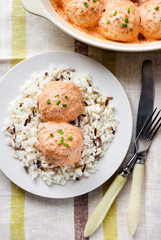 Chicken meatballs in creamy tomato sauce with rice