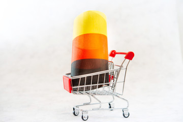 Business concept photo - shopping cart with German flag