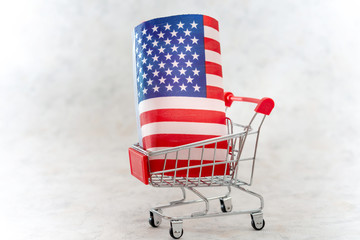Business concept photo - shopping cart with American flag
