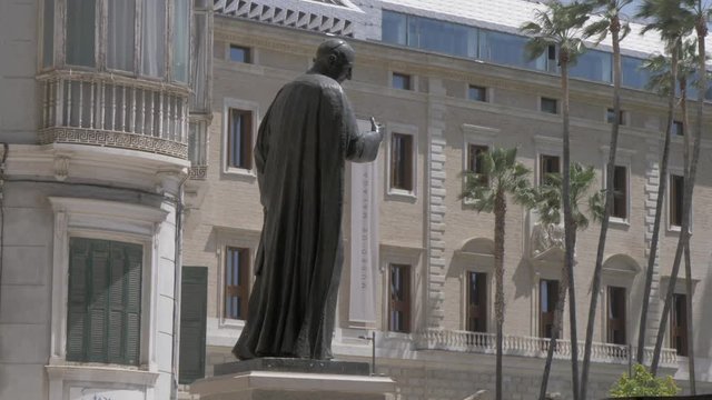 View of statue outside Malaga Museum (Palacio de la Aduana), Malaga, Andalucia, Spain, Europe