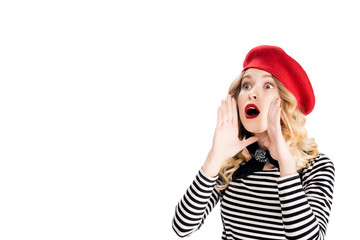 attractive woman in red beret screaming isolated on white