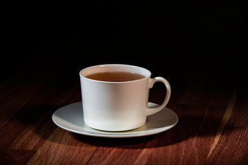 cup of tea on wooden table
