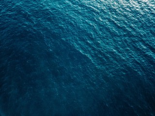 Aerial view of blue sea surface - Powered by Adobe