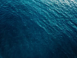 Foto auf Acrylglas Luftaufnahme der blauen Meeresoberfläche © nblxer