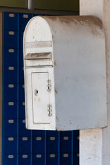A Dirty White Post Box