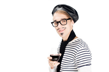 happy french man holding glass of wine and smiling isolated on white
