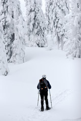 Men trekking in the mountains. Winter mountain landscape.