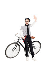 happy french man standing near bicycle and waving hand isolated on white