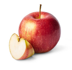 Ripe, fresh, red apple and slice of apple cut out.