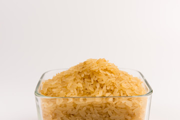 white rice in bowl isolated on white background