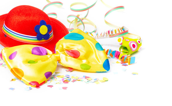 Carnival decoration with carnival hat, bow tie, confetti