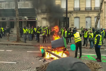Abstract, blur, bokeh background, defocusing - image for the background. Street riots in Paris, France