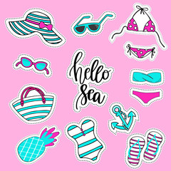 Striped blue, white and red beach accessories in a marine style. Female summer bikini swimsuit, hat, bag, sunglasses, flip flops,
